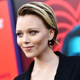 Actress Ivanna Sakhno wears a black outfit on a red carpet in 2018.